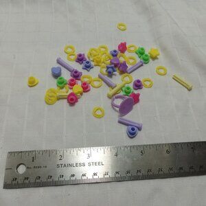 Set of vintage colored plastic staples for scrapbooking or art projects